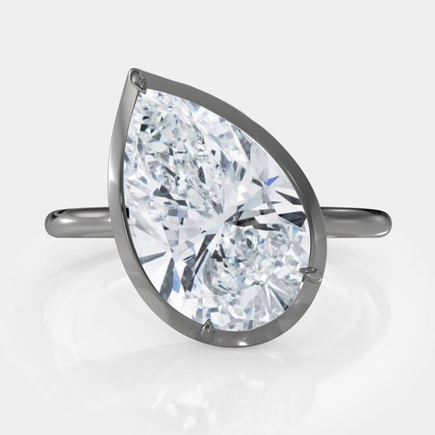 Two-Tone Tilted Pear Diamond Ring